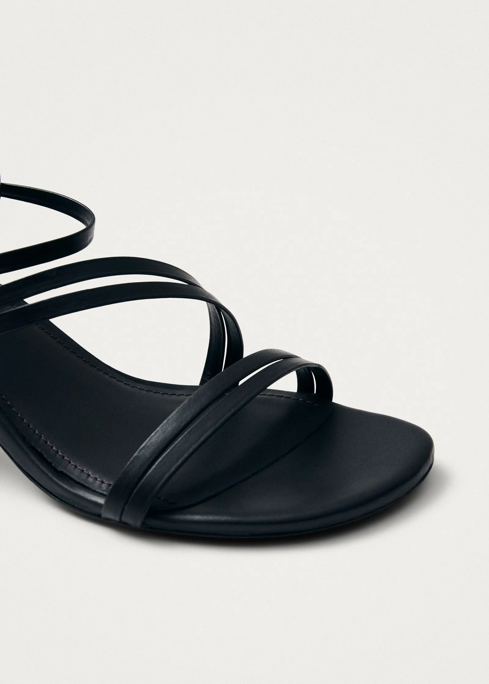 Curly Black Leather Sandals