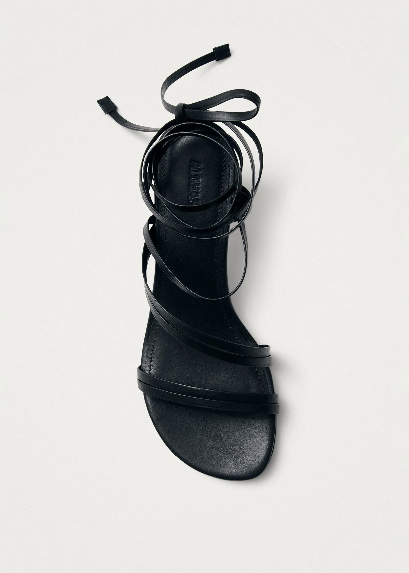 Curly Black Leather Sandals