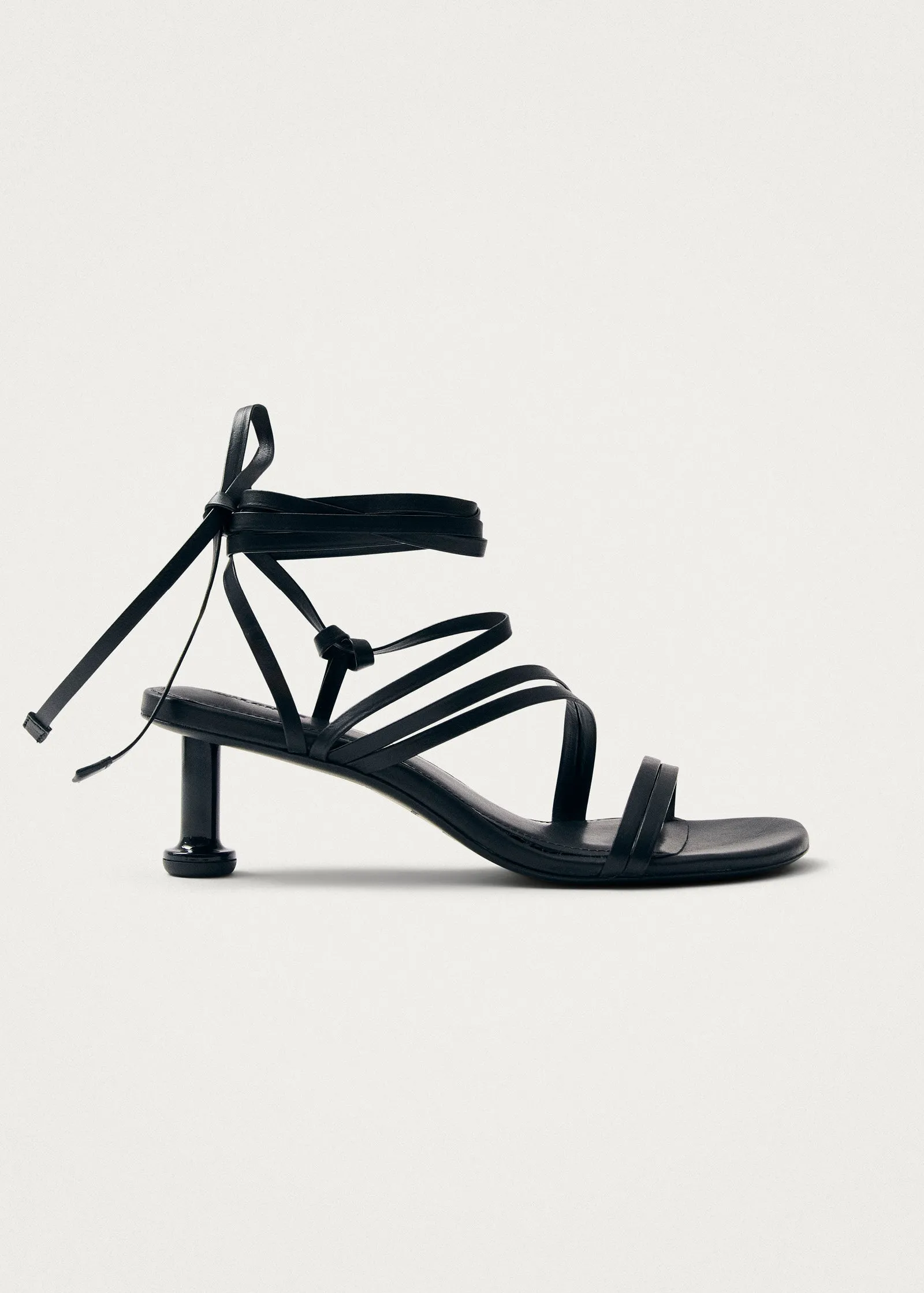Curly Black Leather Sandals