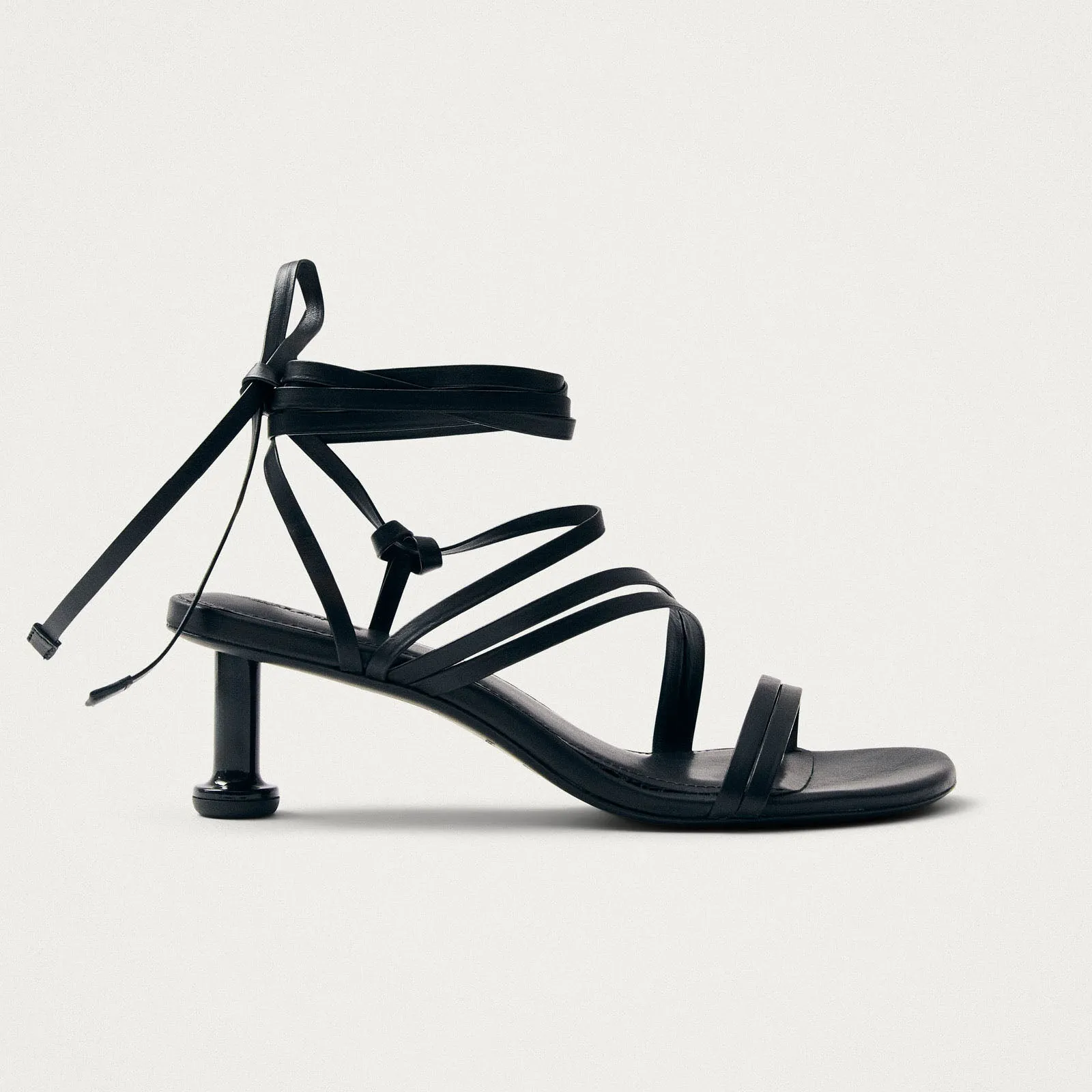 Curly Black Leather Sandals